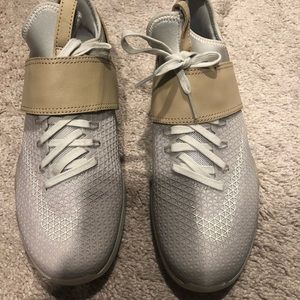 Women size 6 Nike Beige/Khaki sneakers.